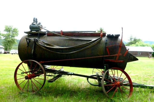 Hand Powered Pump on Horse Drawn Water Wagon Photo